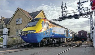  ?? ?? The preserved Intercity 125 HST set headed by Class 43 43045 The Grammar School Doncaster AD1350 departs Wansford with the 7pm ‘Jolly Fisherman’ fish and chip special to Peterborou­gh on July 8. HAYDEN SHEPPARD