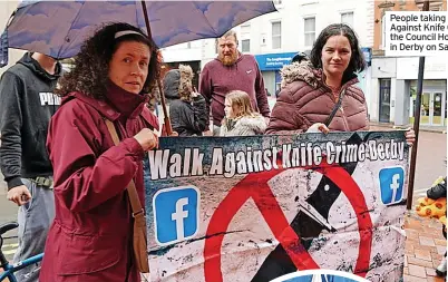  ?? ?? People taking part in the Walk Against Knife Crime between the Council House to the Spot in Derby on Saturday