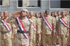  ?? — AFP ?? Yemeni fighters from the Popular Resistance Committees, loyal to President Abedrabbo Mansour Hadi, attend a graduation ceremony in Taez.