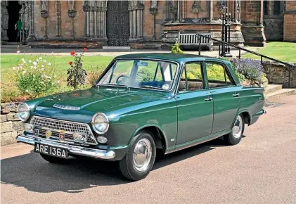  ??  ?? A 1963 Ford Cortina 1500 GT that is headed to auction in the UK.