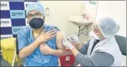  ??  ?? A doctor gets vaccinated in New Delhi on January 18.