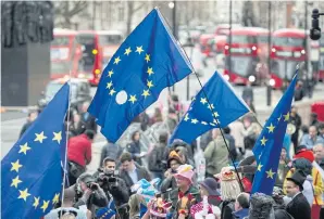  ?? AFP ?? Anti-Brexit protesters demonstrat­e on Whitehall opposite Downing Street after the UK invoked Article 50.