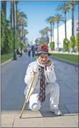  ??  ?? Abdelsalam performs on a main avenue in Rabat.