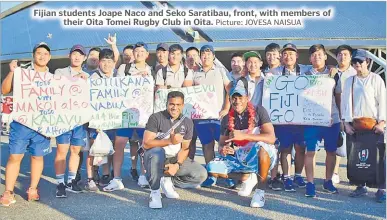  ?? Picture: JOVESA NAISUA ?? Fijian students Joape Naco and Seko Saratibau, front, with members of their Oita Tomei Rugby Club in Oita.