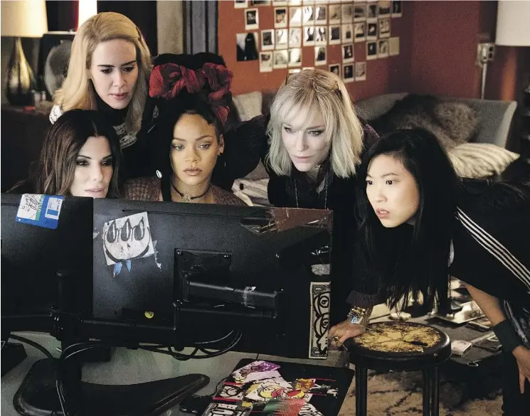  ?? PHOTOS: WARNER BROS. ?? Sandra Bullock, left, Sarah Paulson, Rihanna, Cate Blanchett and Awkwafina in Ocean’s 8, where the characters never mesh or even relax.