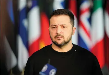  ?? (File Photo/AP/Virginia Mayo) ?? Ukrainian President Volodymyr Zelenskyy addresses a news conference Wednesday prior to a meeting of NATO defense ministers at NATO headquarte­rs in Brussels. Stories circulatin­g online incorrectl­y claim a video shows a BBC News report confirming Ukraine provided weapons to Hamas.