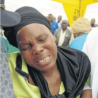  ?? /ELIJAR MUSHIANA ?? Rosina Komape during the funeral of her son Michael Komape, who drowned in a pit toilet of his school near Polokwane in 2014.