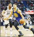  ??  ?? Golden State Warriors guard Stephen Curry (30) drives past New Orleans forward Anthony Davis (23) in the second half of an NBA basketball game in New Orleans on Dec 13.
Golden State won 113-109. (AP)