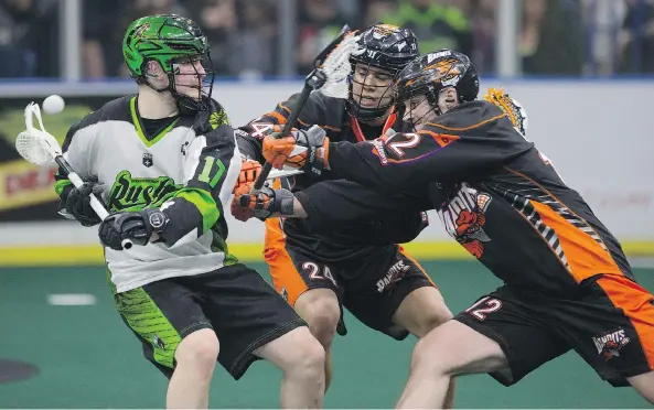  ?? KAYLE NEIS ?? Saskatchew­an forward Robert Church looks to pass as Buffalo forward Mitch Jones and defender Mitch de Snoo give chase at SaskTel Centre in Saskatoon on Friday.