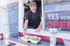  ?? JIM BYERS ?? Norman Zeledon whips up wildly creative dishes — even a Mennonite-style pickle soup — at his food truck in Summerside, P.E.I.