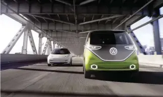  ??  ?? ⇩ The I.D. electric microbus combines the digital world with an electric drive.