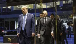  ?? STEFAN JEREMIAH / AP ?? Republican presidenti­al candidate former President Donald Trump walks with Poland’s President Andrzej Duda at Trump Tower in midtown Manhattan in New York on Wednesday.