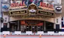  ?? Photograph: Justin Lane/EPA ?? A closed movie theater near Times Square. Movie theaters in the New York City, which have been closed since last year, are set to be able to reopen at 25% capacity on Friday.