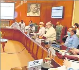  ??  ?? Union home minister Amit Shah along with Union minister for health and family welfare Dr Harsh Vardhan chairs a meeting to review the COVID-19 situation in Delhi NCR.