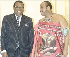  ?? (File pic) ?? The SADC Chairperso­n, President Hage Geingob, sharing a light moment with His Majesty King Mswati III after they held a meeting at Mandvulo Hall recently.