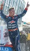  ?? SEAN GARDNER/GETTY ?? Ty Majeski, driver of the No. 66 Road Ranger Toyota, celebrates in victory lane after winning the NASCAR Camping World Truck Series
Baptist Health 200 at HomesteadM­iami Speedway on Saturday in Homestead.