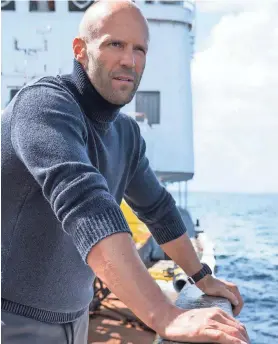  ?? PHOTOS BY WARNER BROS. ?? Jason Statham is going to need more than just a bigger boat to take on megalodon in “The Meg.”