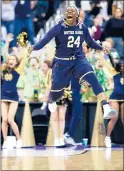  ?? ANDY LYONS/GETTY ?? Notre Dame’s Arike Ogunbowale celebrates during overtime against UConn in the semifinals of the 2018 Final Four.