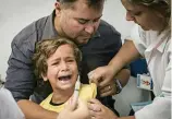  ?? — AFP ?? Yasuyoshi Chiba, a young boy, is given the yellow fever vaccine in Rio de Janeiro in March 2017.