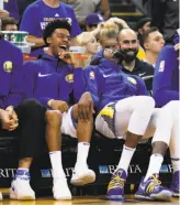  ?? Scott Strazzante / The Chronicle 2017 ?? Quinn Cook and Kevin Durant were having a good time on the Warriors’ bench in November. The two have known each other since Durant was a freshman in high school, when both were part of the same AAU program, though Cook is four years younger.