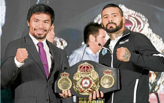  ?? —AP ?? Sen. Manny Pacquiao (left) and Argentine WBA welterweig­ht champion Lucas Matthysse are all set for their Sunday clash.