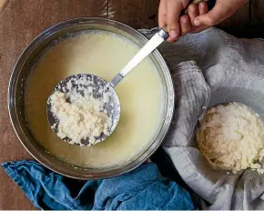  ??  ?? Ricotta is simple to make and children enjoy watching the magical separation of the curds when the lemon juice or vinegar is added to the hot milk.