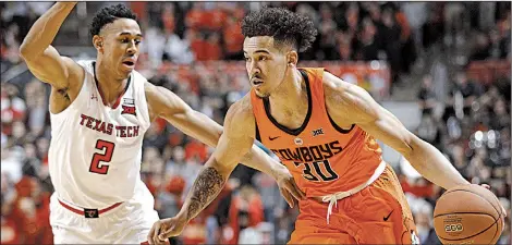  ?? AP/BRAD TOLLEFSON ?? Oklahoma State senior forward Jeffrey Carroll (30) scored 20 points in the Cowboys’ victory over the Arkansas Razorbacks last season. Carroll is averaging a teamhigh 16.2 points per game as Oklahoma State comes to Walton Arena in Fayettevil­le today as...