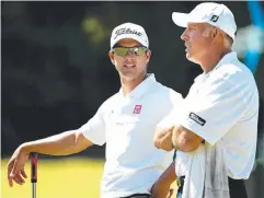  ??  ?? PARTNERS AGAIN: Adam Scott with his caddie Steve Williams.