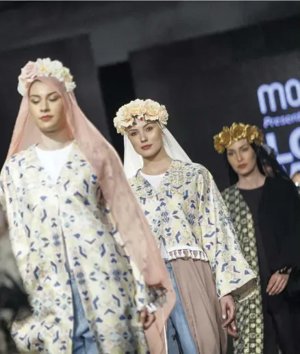  ?? Getty ?? Models walk in Islamic designs at London Modest Fashion Week event in April