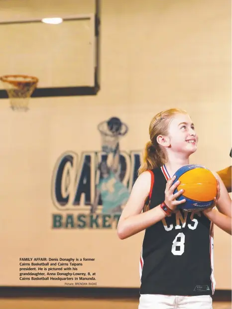  ??  ?? FAMILY AFFAIR: Denis Donaghy is a former Cairns Basketball and Cairns Taipans president. He is pictured with his granddaugh­ter, Anna Donaghy-Lowrey, 8, at Cairns Basketball Headquarte­rs in Manunda.Picture: BRENDAN RADKE