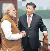  ?? FILE PHOTO ?? Prime Minister Narendra Modi and Chinese President Xi Jinping share a moment in Wuhan, China.