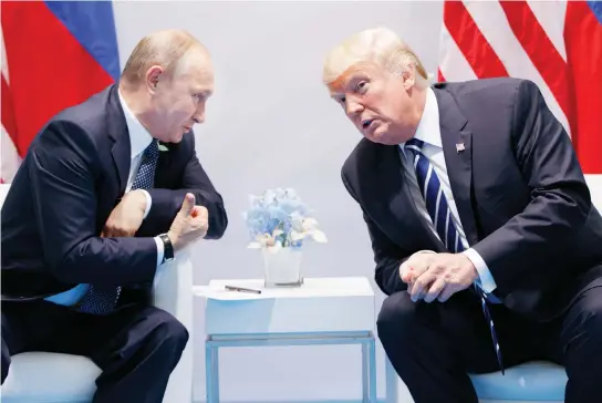  ??  ?? US President Donald Trump speaks during a meeting Friday with Russian President Vladimir Putin at the G-20 Summit in Hamburg, Germany. (AP)