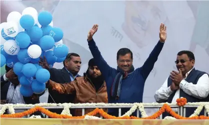  ?? Photograph: Rajat Gupta/EPA ?? The Aam Aadmi party leader, Arvind Kejriwal, waves at supporters.