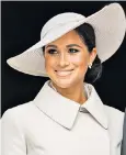  ?? ?? Meghan chose to toe the line with a strong nod to decorum, dressing primly in white