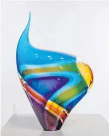  ??  ?? Baby Incalmo Vessel V, Blue, Purple &amp; Orange, is among new glass sculptures by Paull Rodrigue at West End Gallery, 1203 Broad St., to Nov. 8.