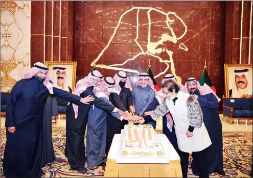  ?? KUNA photo ?? Foreign Minister Sheikh Dr Ahmad Nasser Al-Mohammad and other senior government officials during the cake-cutting ceremony.