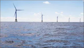 ?? Eric Thayer / Bloomberg ?? The GE-Alstom Block Island Wind Farm stands in the water off Block Island, R.I.