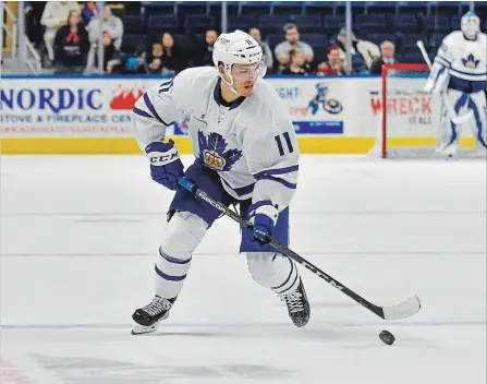  ?? GREGORY VASIL GETTY IMAGES ?? Andreas Johnsson of the Toronto Marlies brings the puck up ice during a game against the Bridgeport Sound Tigers at the Webster Bank Arena on Jan. 21 in Bridgeport, Connecticu­t.