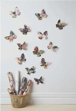  ?? Photo by Bryce Carleton ?? Create a wall of butterflie­s with old wallpaper, like these in Resene Wallpaper Collection 606874. Project by Leigh Stockton.