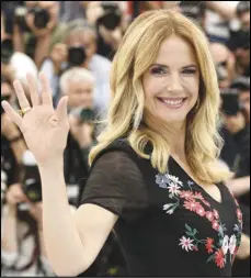  ?? ARTHUR MOLA/INVISION VIA AP ?? In this May 15, 2018 file photo, actress Kelly Preston poses for photograph­ers during a photo call for the film ‘Gotti’ at the 71st internatio­nal film festival, Cannes, southern France.