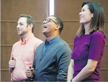  ?? GERRY KAHRMANN/PNG ?? Harrison Mooney, centre, and possible contestant­s participat­e in a trial game at the Jeopardy! tryouts at the Sheraton Wall Centre on Sunday.