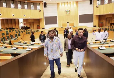  ?? — Picture: Memory Mangombe ?? Eswatini leader King Mswati III’s son, Prince Lindani Nkosi (left) and his delegation tour the New Parliament Building in Mt Hampden, yesterday.