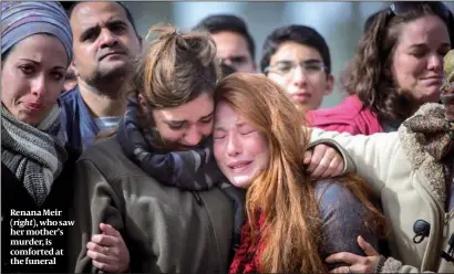  ?? PHOTO: FLASH 90 ?? Renana Meir ( right), whosaw her mother’s murder, is comforted at the funeral