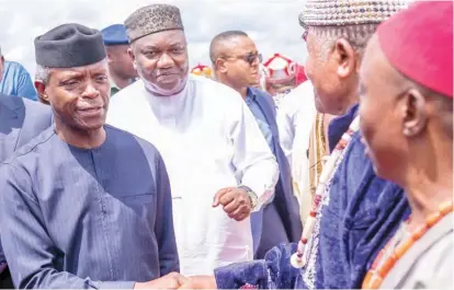  ??  ?? Acting President Prof. Yemi Osinbajo (left), being introduced to traditiona­l rulers by Gov Ifeanyi Ugwuanyi of Enugu State (2nd left), during the acting president’s arrival at Enugu yesterday to attend the 30th National Biennial Conference organised by the Student Christian Movement (SCM) of Nigeria VP’s Office