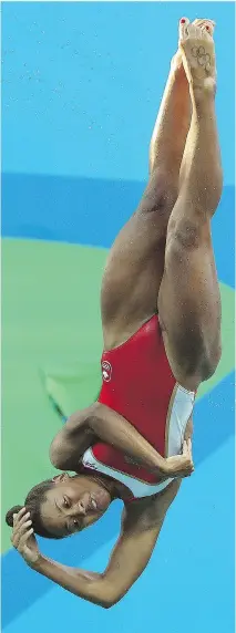  ?? DAVE ABEL ?? Canada’s Jennifer Abel dives during the three-metre springboar­d final on Sunday at the Maria Lenk Aquatics Centre in Rio.