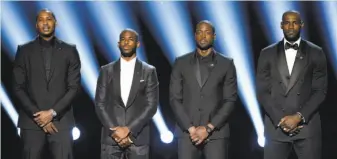  ?? Chris Pizzello / Invision ?? Carmelo Anthony (left), Chris Paul, Dwyane Wade and LeBron James issued a call to action for athletes during the ESPY Awards in July, leaving room for specific ideas.