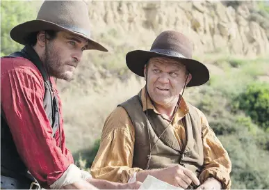  ?? TIFF ?? Joaquin Phoenix, left, and John C. Reilly in the movie version of Patrick deWitt’s novel The Sisters Brothers.