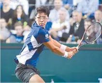  ?? EPA-Yonhap ?? Chung Hyeon of Korea is seen in action against Mischa Zverev of Germany during their first round match at the Rolex Paris Masters tennis tournament in Paris, France, Tuesday. Chung defeated Zverev 6-0, 6-2..