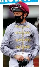  ?? PA ?? Battle royal: Dettori is masked and fired up for glory at Ascot