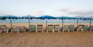  ??  ?? SOE ZEYA TUN/REUTERS Empty chairs are seen on a beach which is usually full of tourists, amid fear of coronaviru­s in Phuket, Thailand.